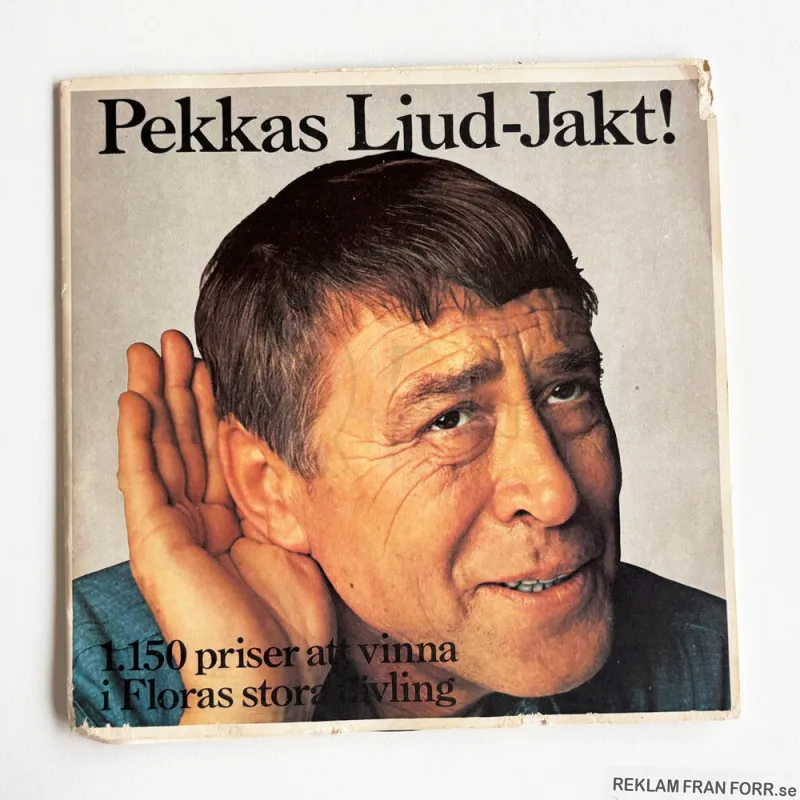 Omslaget till singeln Pekkas Ljud-Jakt, reklam från Flora