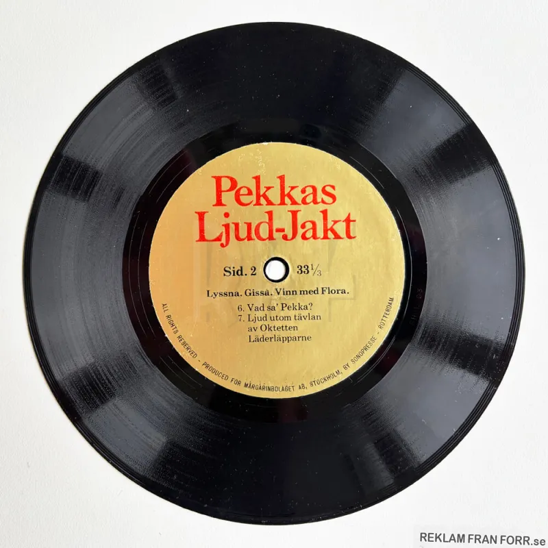 Sid B av singeln Pekkas Ljud-Jakt, reklam från Flora